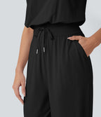 Combinaison de yoga col bateau sans manches dos nu avec découpes et poches latérales à cordon de serrage effet frais InstantCool, protection solaire UPF50+