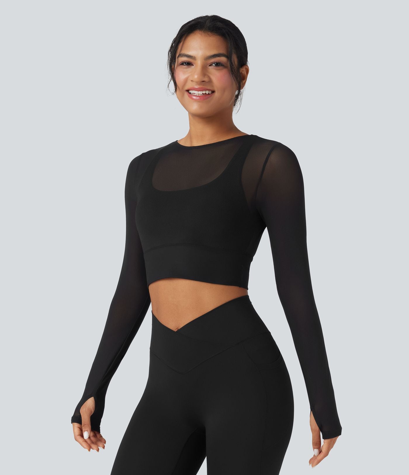 Haut de sport yoga cropped 2-en-1 manches longues mesh contrastant à trous pouces