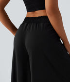 Pantalon fluide taille haute à fronces avec poches