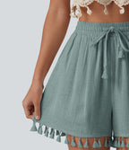 Short ample de vacances en mélange de lin taille haute avec cordon de serrage et ourlet à franges à poches