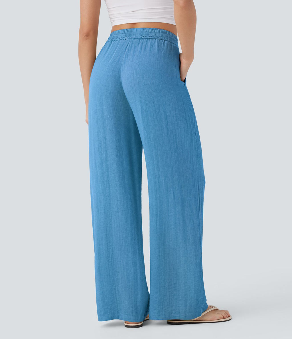 Pantalon large fluide taille haute avec cordon de serrage, poches latérales et aspect lin