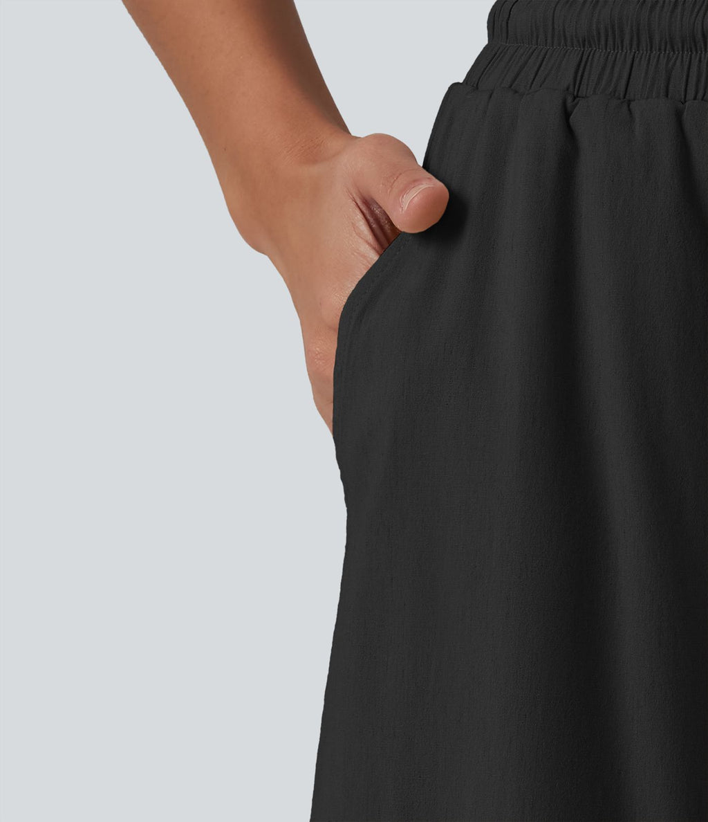 Pantalon large fluide en lin stretch taille haute avec cordon de serrage et poches