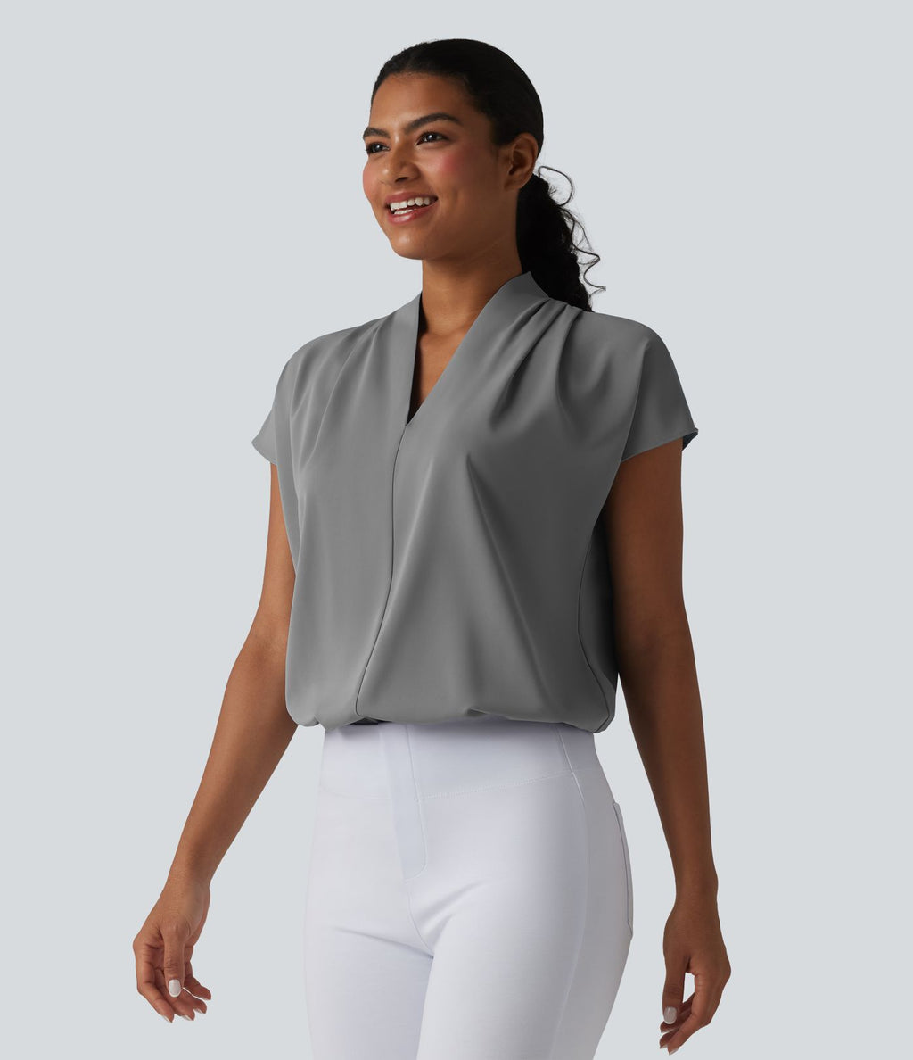 Blouse esprit bureau ample défroissage facile, col V et manches chauve-souris