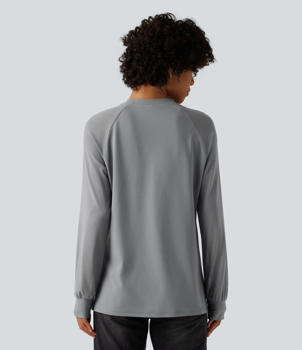 Blouse mesh contrastant col rond manches raglan longues