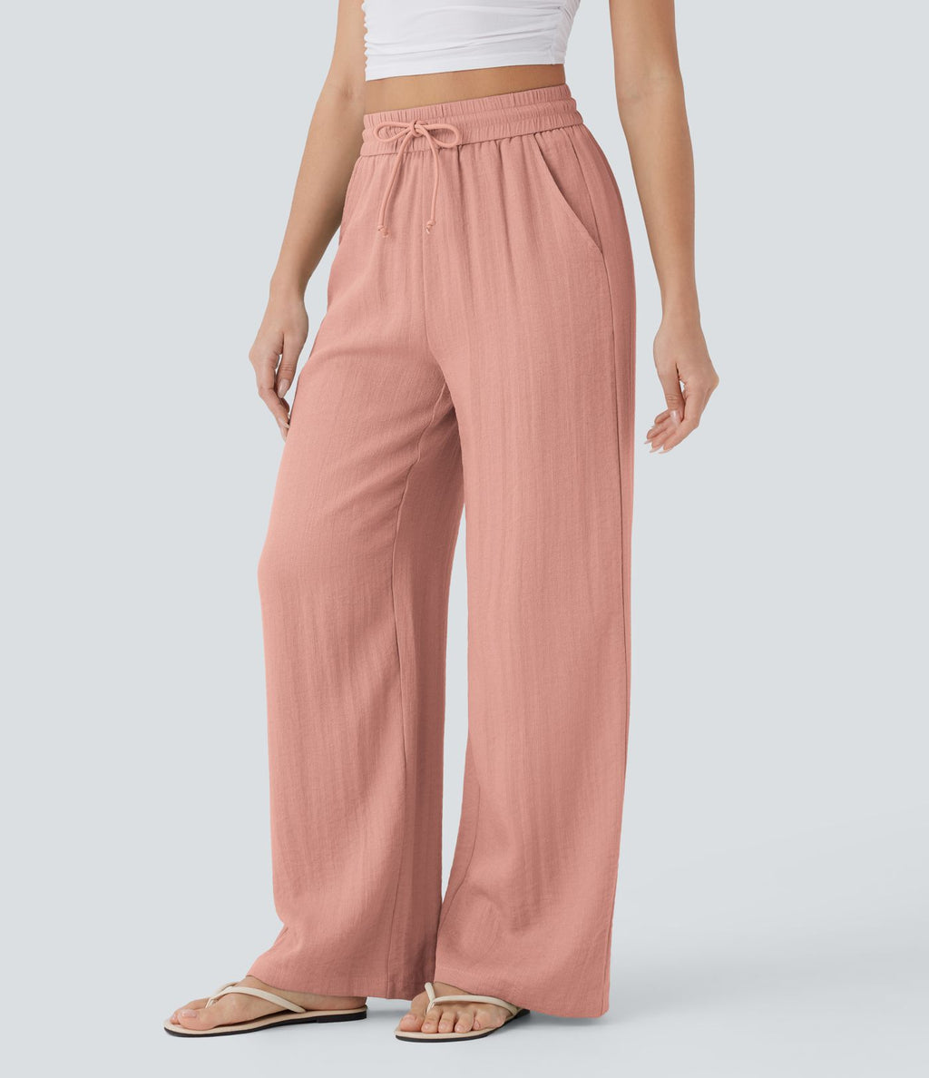 Pantalon large fluide taille haute avec cordon de serrage, poches latérales et aspect lin