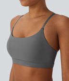 Brassière de sport en similicuir à faible maintien, dos nu, bretelles croisées ajustables et séchage rapide pour yoga