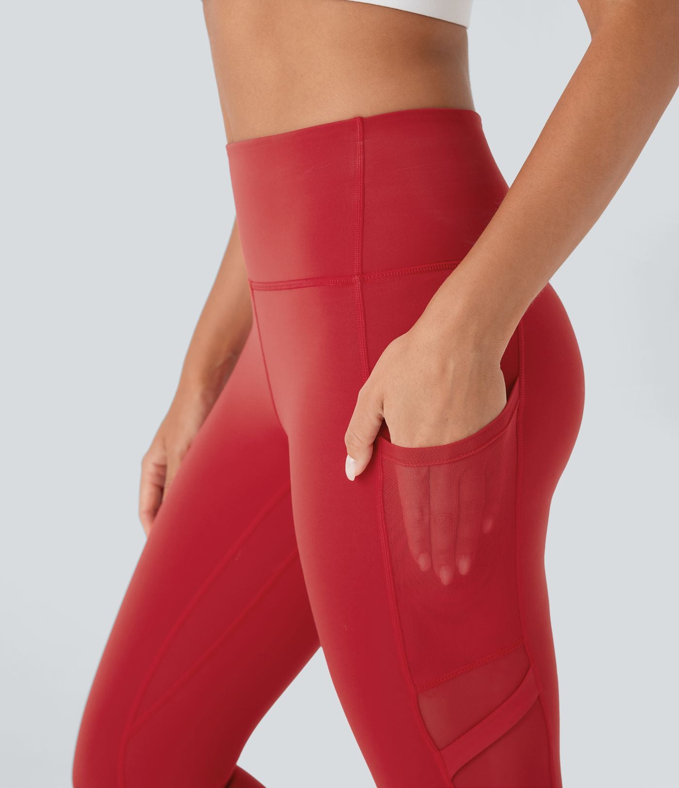 Legging de yoga 7/8 SpeedWave™ taille haute avec poches latérales et empiècements en mesh contrastés à séchage rapide