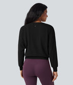 Top de sport yoga SoftlyZero™ Airy col rond manches longues ourlet croisé