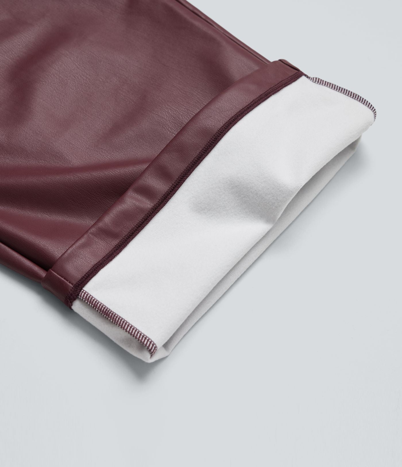 Pantalon large en tissu enduit molleton taille haute avec poches