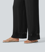 Pantalon effet lin taille haute avec cordon de serrage, bord volanté et poches