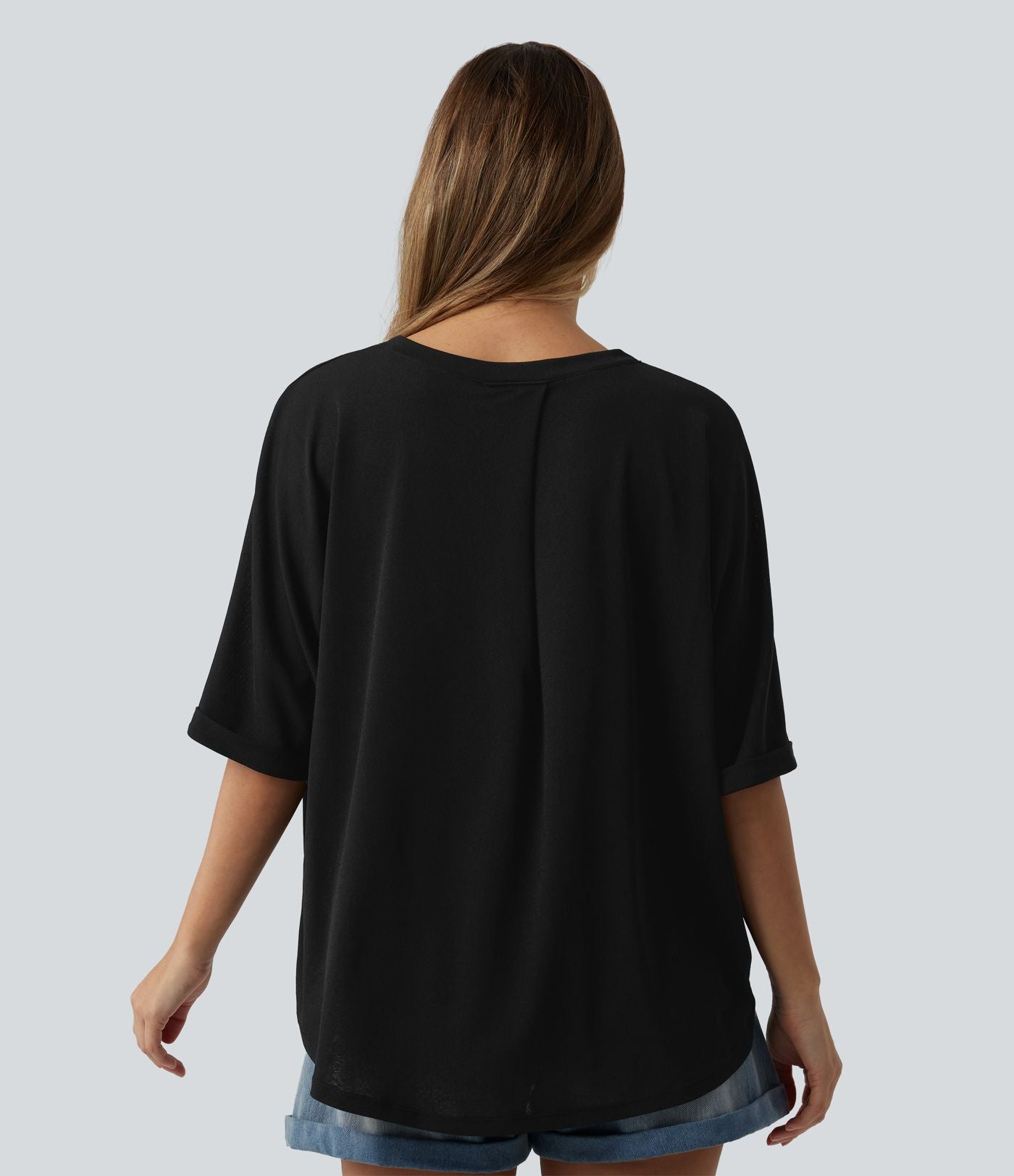 T-shirt décontracté col rond manches mi-longues ourlet asymétrique