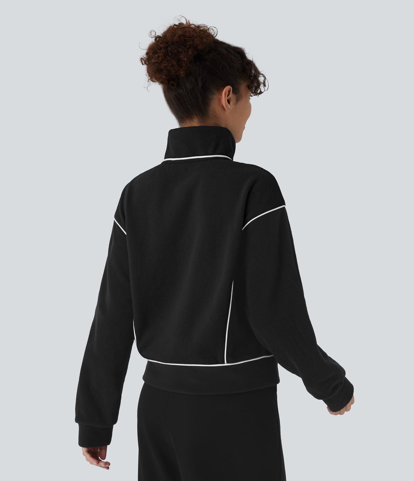 Sweat bicolore en polaire col montant avec demi-zip et manches longues