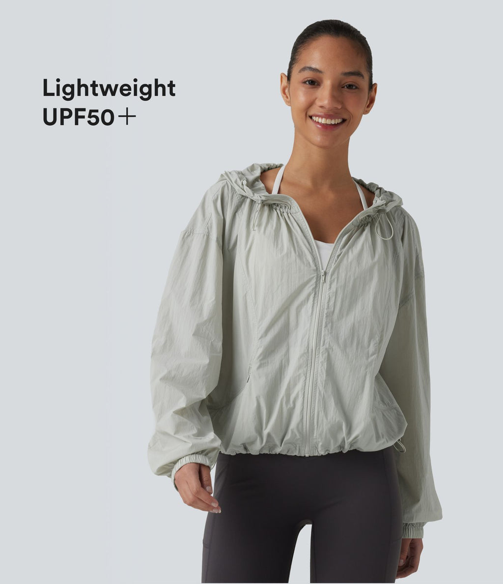 Veste de course légère à capuche manches longues avec poches, cordon de serrage et protection UPF 50+