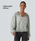 Veste de course légère à capuche manches longues avec poches, cordon de serrage et protection UPF 50+