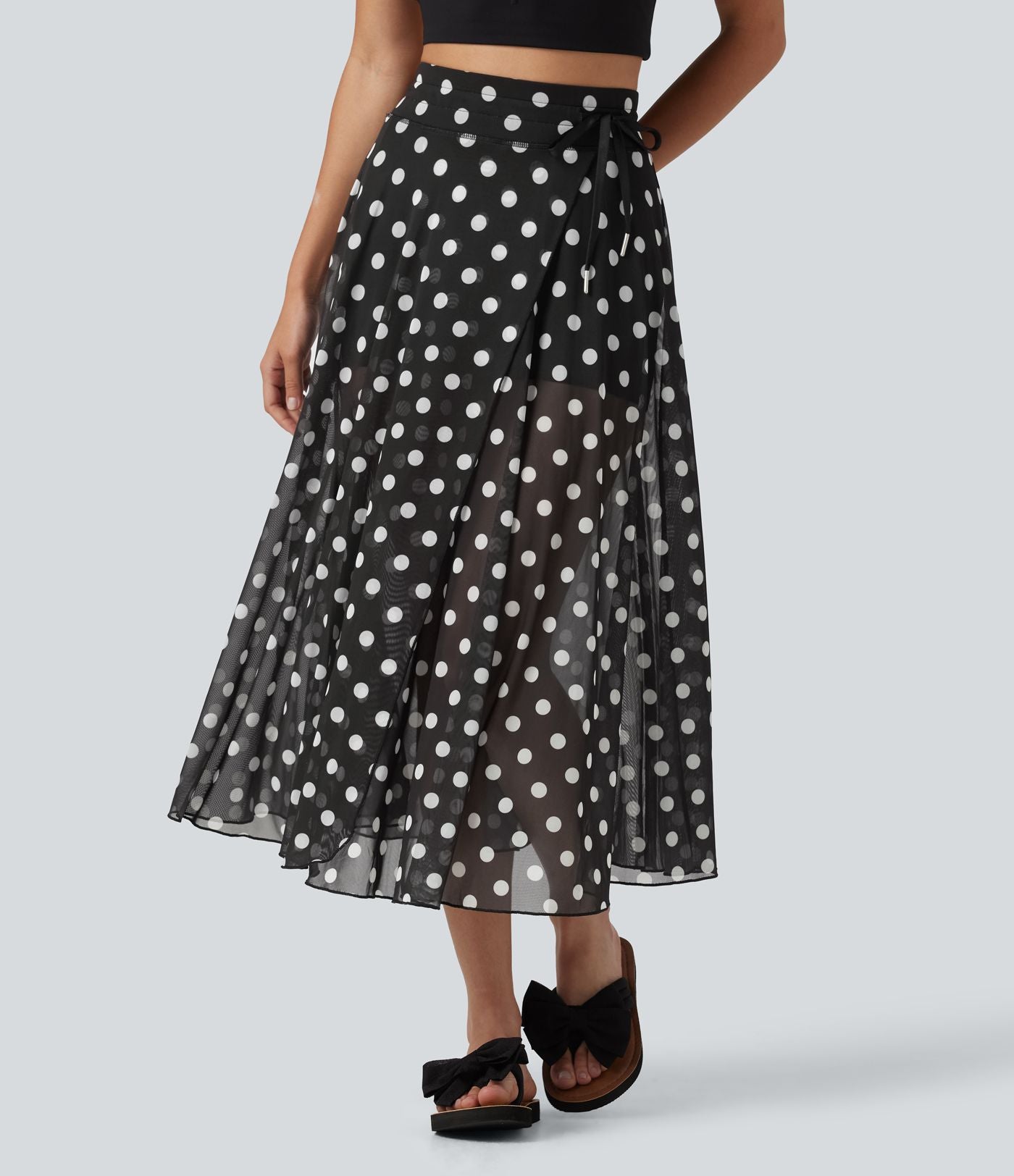 Jupe-short midi fluide évasée taille haute style vacances en mesh à pois avec cordon de serrage et poches