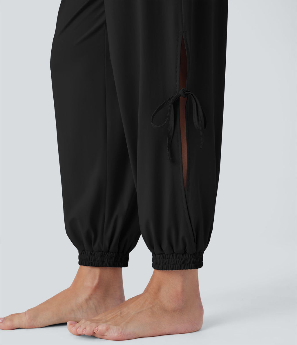 Combinaison de yoga col bateau sans manches dos nu avec découpes et poches latérales à cordon de serrage effet frais InstantCool, protection solaire UPF50+
