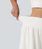 Short de running 2-en-1 taille haute croisée en tissu froissé avec ourlet fendu et poches