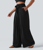 Pantalon large resort taille haute aspect lin avec nœud frontal et poches