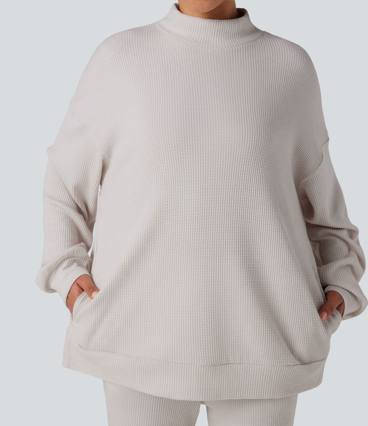 Sweat-shirt gaufré col montant manches longues coupe décontractée avec poches