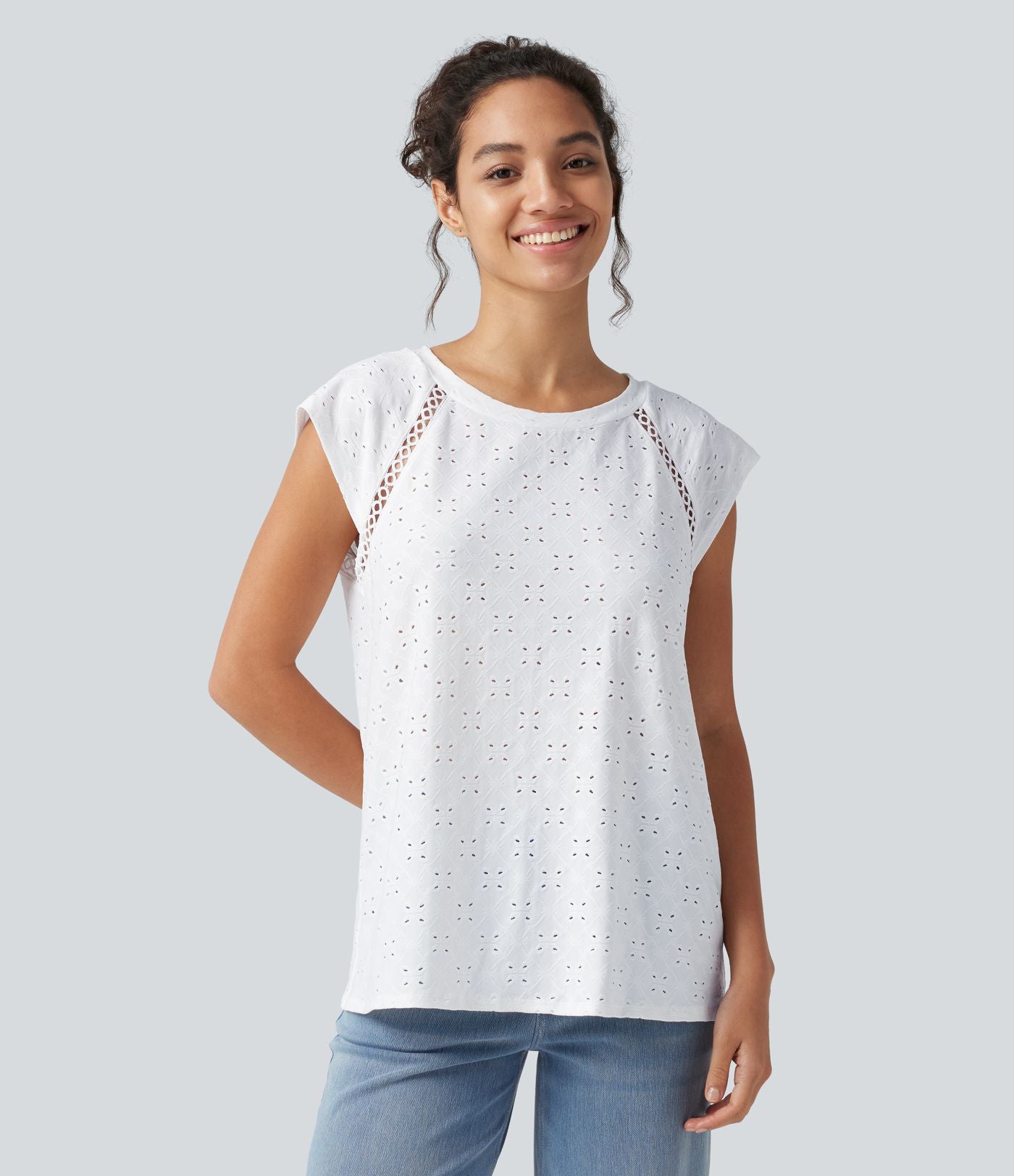 Blouse décontractée à col rond, mancherons, découpes et lien au dos
