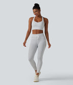 Brassière de sport yoga à rayures dos nageur croisé maintien léger avec soutien-gorge intégré