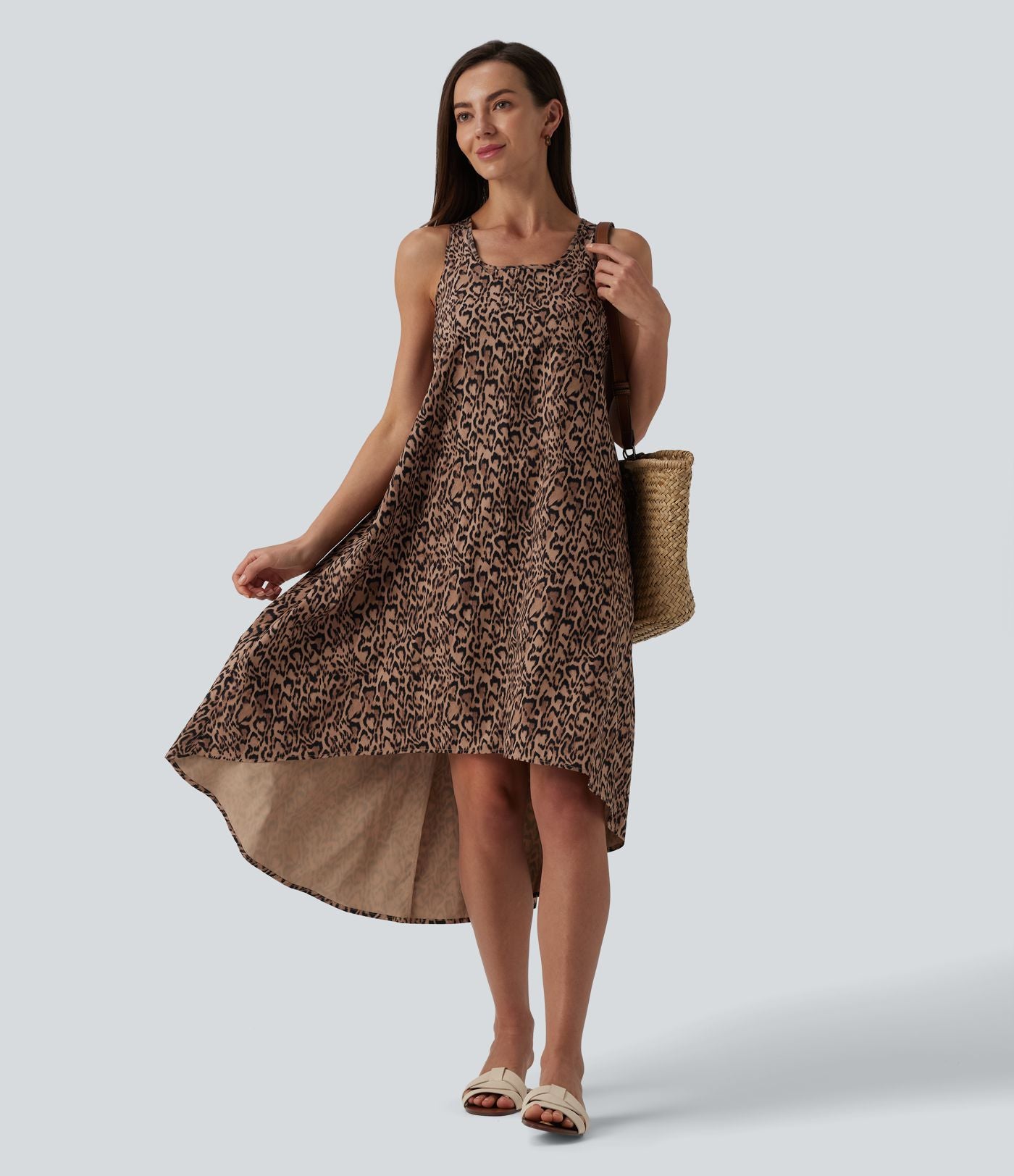 Robe mi-longue fluide station balnéaire dos nageur sans manches asymétrique imprimé léopard avec poches