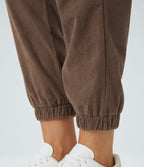 Pantalon décontracté en velours côtelé avec taille mi-haute, boutons et fermeture éclair