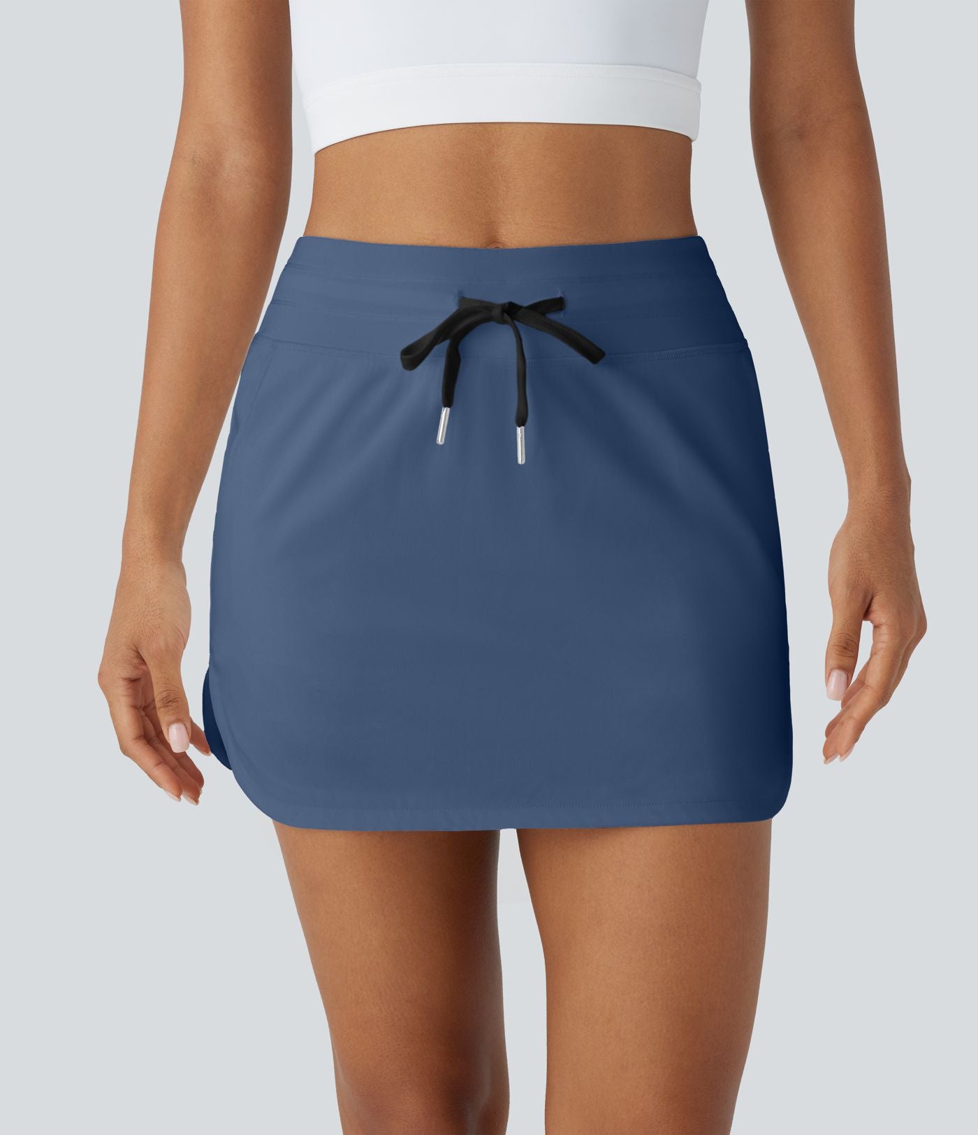Softlyzero™ QuickDry Jupe de golf courte deux-en-un à taille haute avec poches latérales, ourlet arrondi, cordon de serrage - Poche pour tee de golf