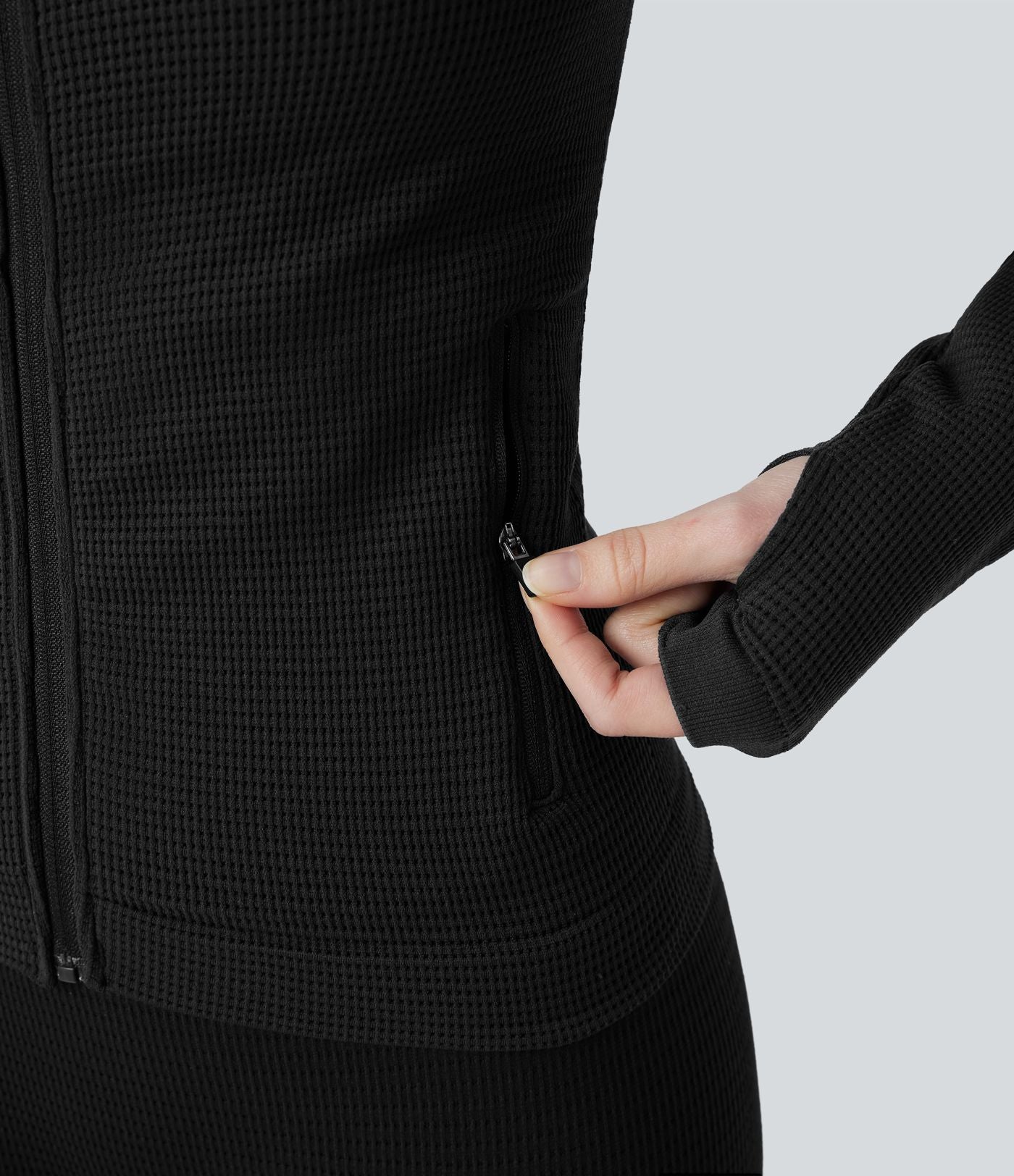 Veste yoga en maille gaufrée à capuche zippée à manches longues avec passants pouces sans couture OneForm Seamless Flow avec poches