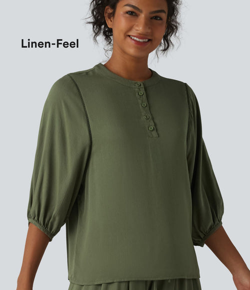 Blouse de villégiature à col Henley et manches 3/4, aspect lin.