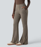 Pantalon évasé côtelé taille mi-haute boutonnage ourlet fendu avec poches