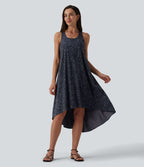 Robe mi-longue fluide station balnéaire dos nageur sans manches asymétrique imprimé léopard avec poches
