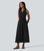 Robe mi-longue fluide col V sans manches avec nœud au dos