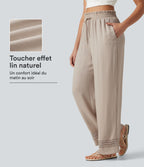 Pantalon effet lin taille haute avec cordon de serrage, bord volanté et poches