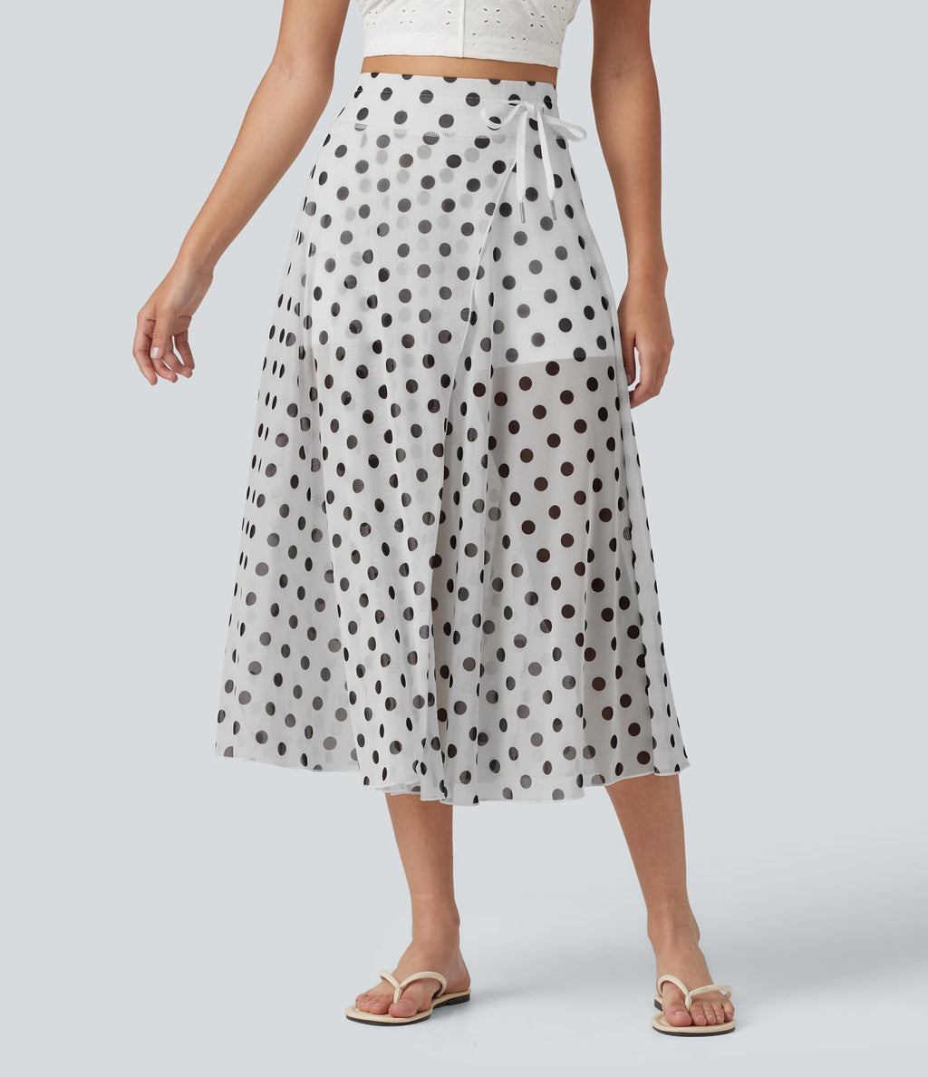 Jupe-short midi fluide évasée taille haute style vacances en mesh à pois avec cordon de serrage et poches