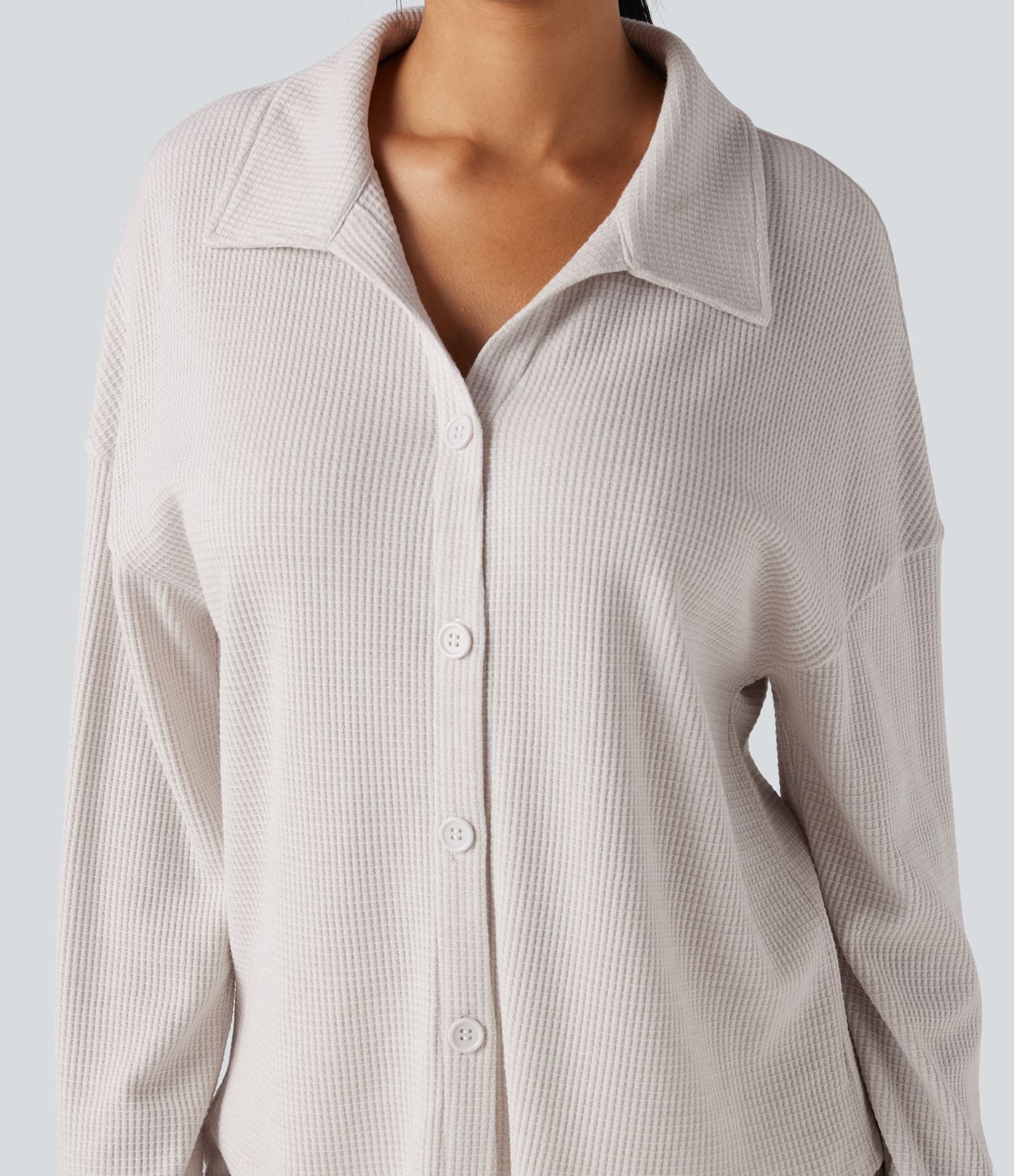 Top détente gaufré col tailleur manches longues boutonnage décontracté