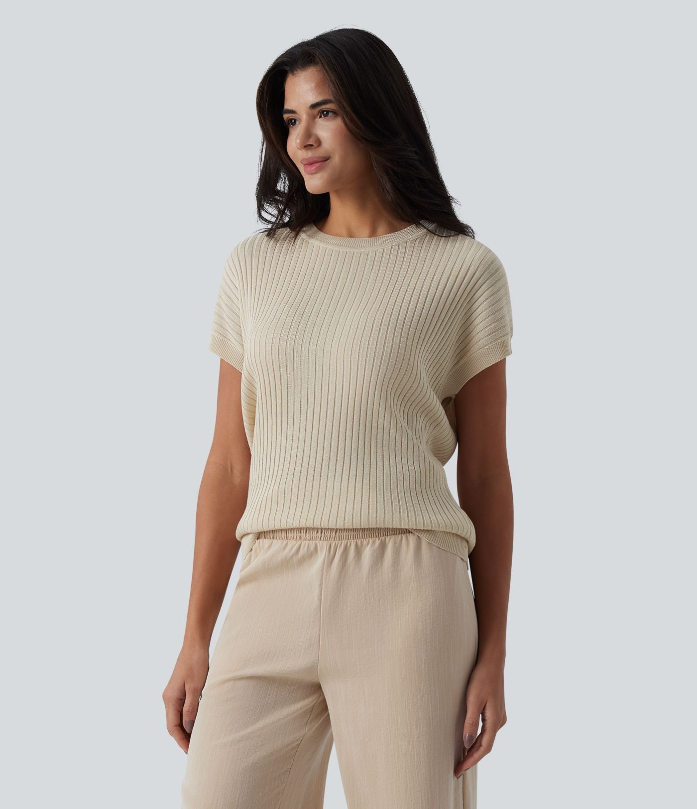 Pull casual col rond manches chauve-souris croisé dos nu
