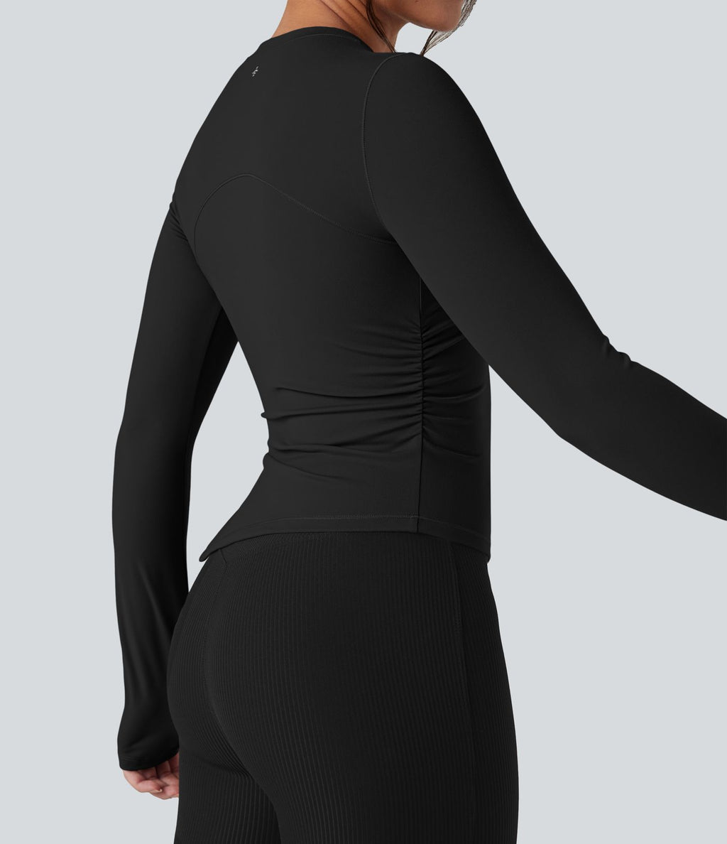 Top de sport yoga col rond ourlet asymétrique fendu manches longues avec trous pouces