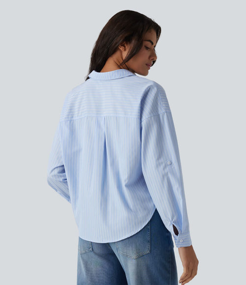Chemise casual col manches retroussées torsadée asymétrique à rayures