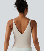 Débardeur de sport effet lissant sous les bras avec dos en V et brassière intégrée