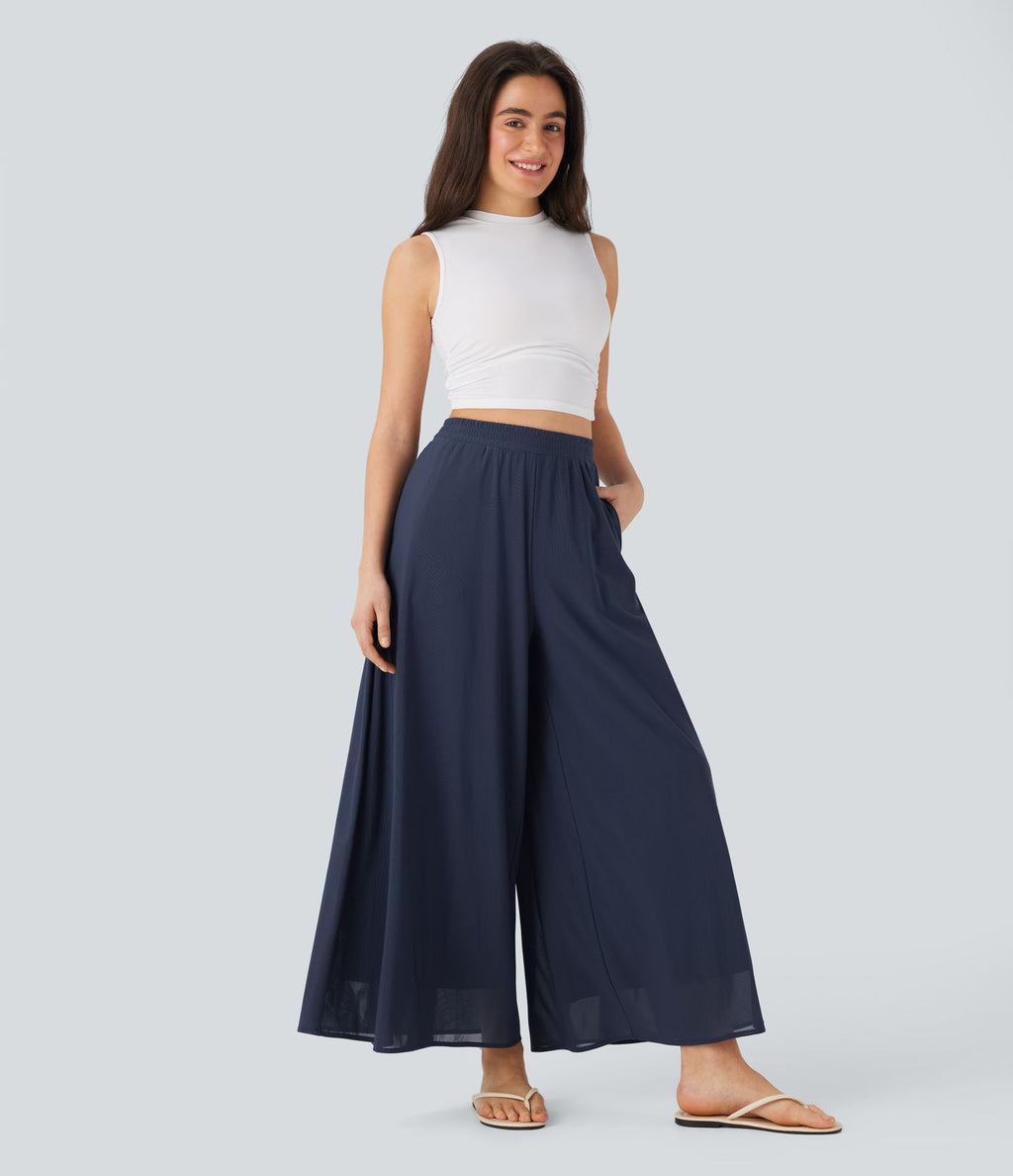 Pantalon fluide et ample avec superposition en mesh, poches latérales et taille haute