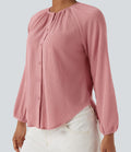 Blouse texturée col rond manches longues ourlet arrondi