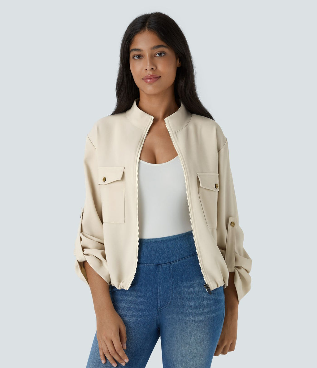 Blouson décontracté à col montant, manches retroussables, poches à rabat, cordon de serrage intérieur et fermeture éclair