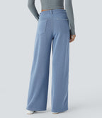 Jean décontracté taille basse en maille gaufrée extensible, jambe large avec poches multiples et fermeture zippée