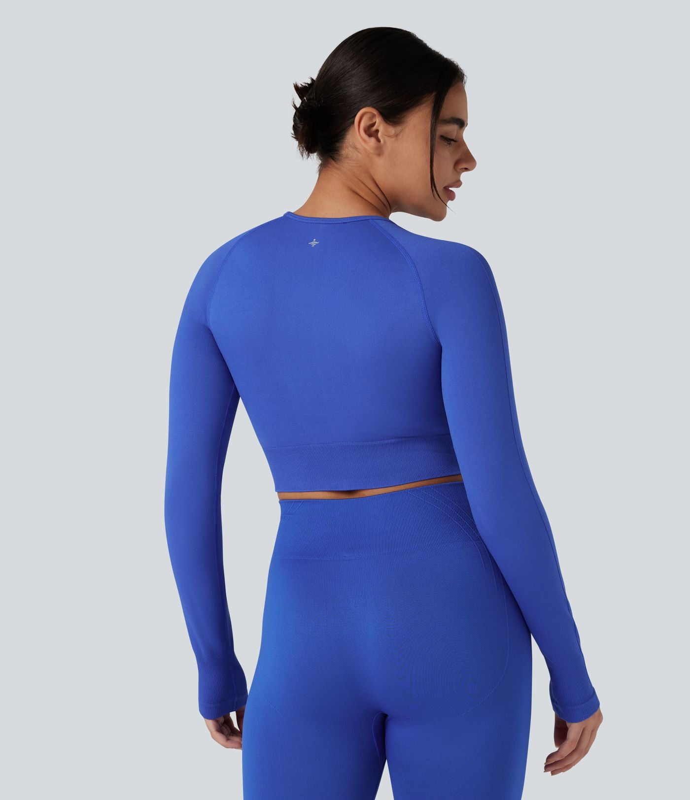Haut de sport yoga court col rond à manches longues avec passants pouces sans couture OneForm Seamless Flow