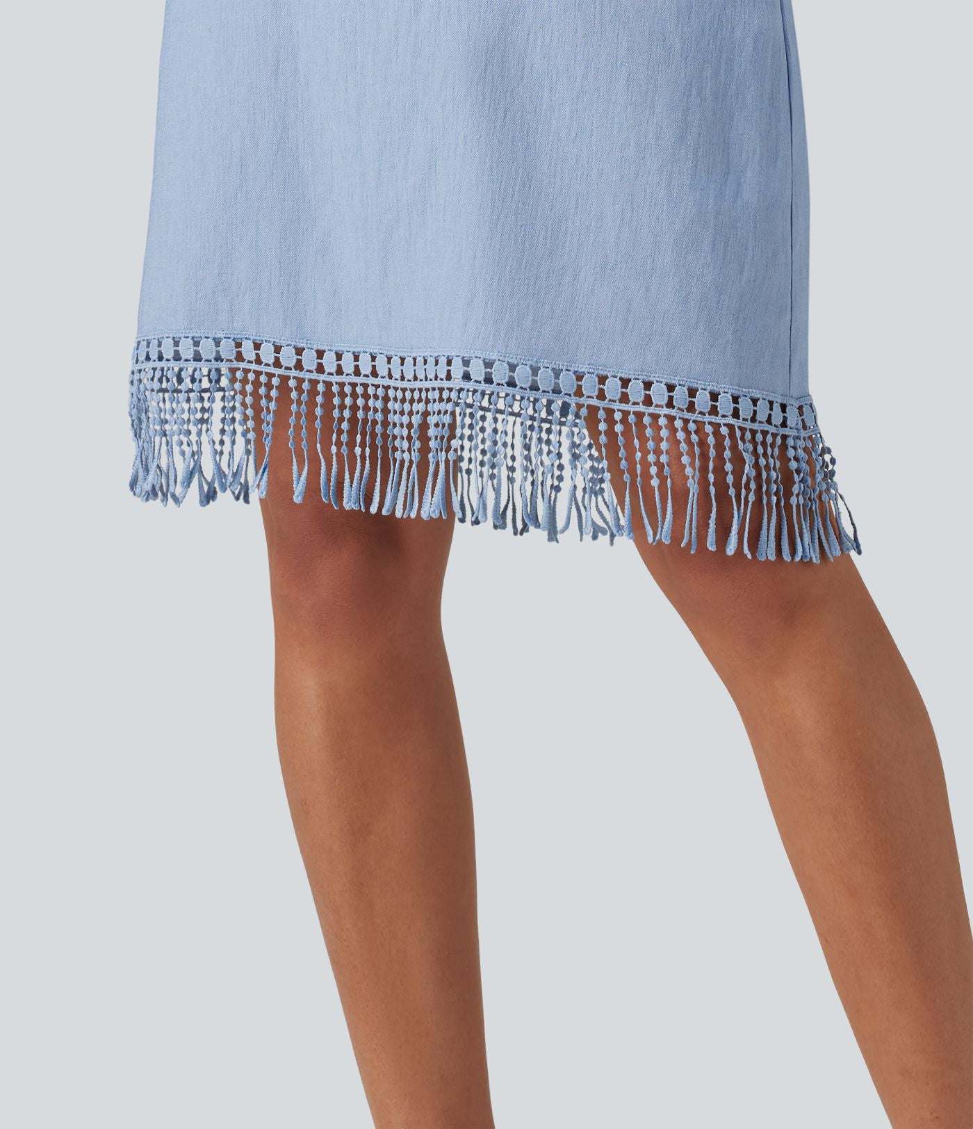 Robe mini sans manches col V avec ourlet à franges