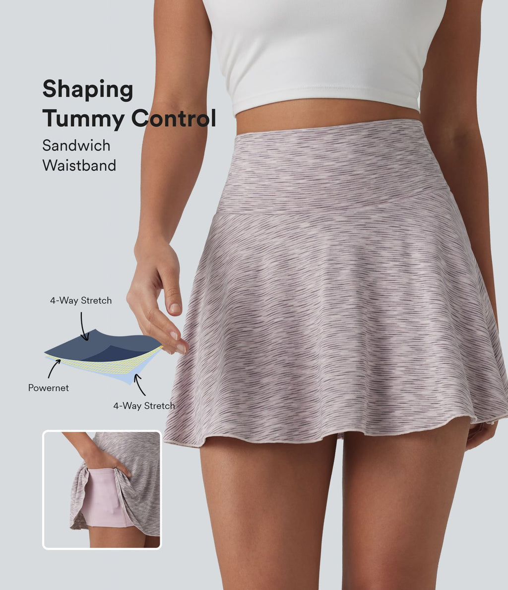 Jupe de sport mini gainante 2-en-1 taille haute à rayures avec poches