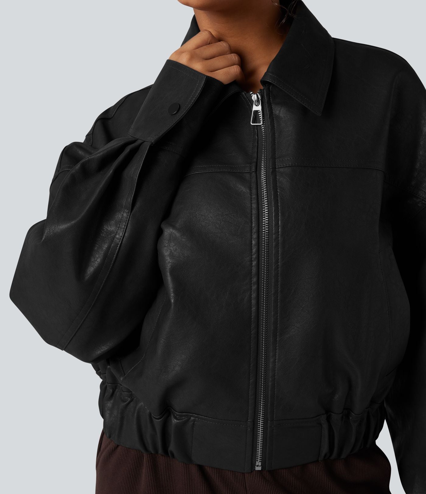 Veste décontractée en tissu enduit à fermeture éclair et manches longues avec poches