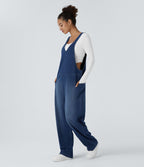 Salopette décontractée Halara Flex™ en denim extensible délavé, col V et poches latérales