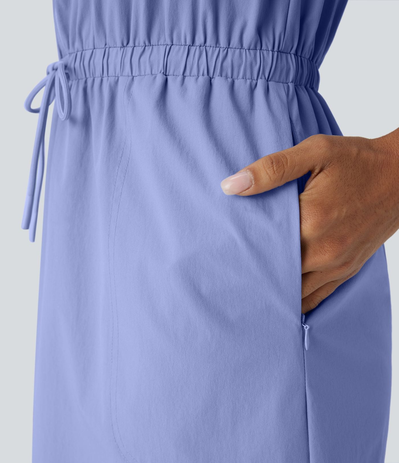 Robe courte de randonnée déperlante et résistante à l'usure, col en U sans manches avec demi-fermeture éclair, cordon de serrage, poches latérales et ourlet arrondi